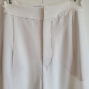 Zara cream color flowy wide leg pants.  size Med but waist is more like a small.